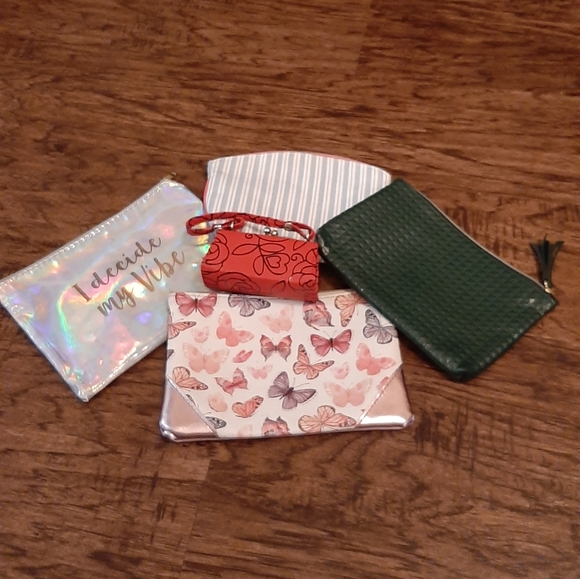 Five random pouches and a lipstick case. - Picture 2 of 4